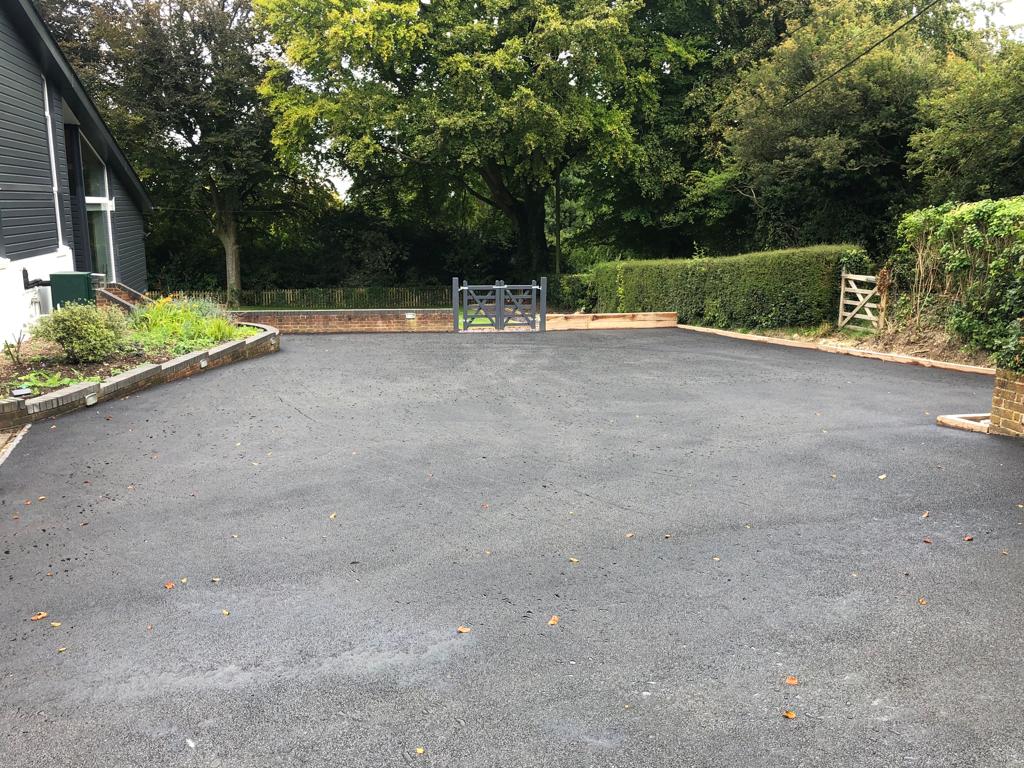 This is a photo of a bitumen driveway which is in the process of being installed by Yarrambat Road Tech