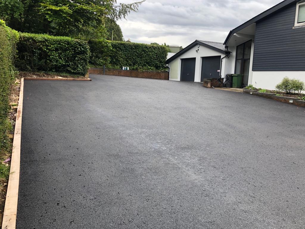 This is a photo of a asphalt driveway which is in the process of being installed by Yarrambat Road Tech