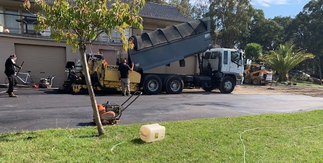 This is a photo of an asphalt driveway which is in the process of being installed by Yarrambat Road Tech